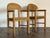 Pair of vintage accent chairs designed by Rainer Daumiller in the 1970s, crafted with a focus on natural materials and...