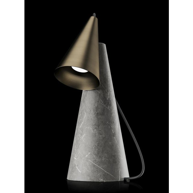 Table lamp with grey stone base and conic bronze lightshade. European Plug (up to 250V).