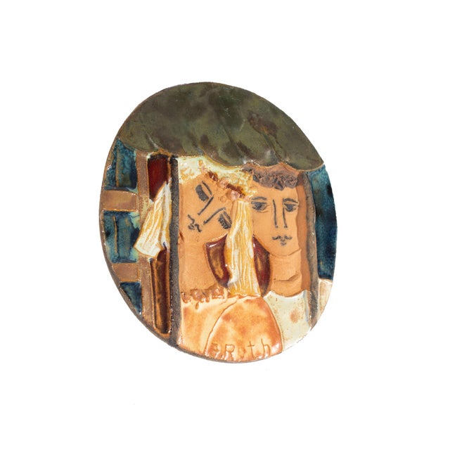 A studio pottery wall plaque by Israeli artist Ruth Faktor Faktorowicz (born 1937). The plaque is circular in shape with a...