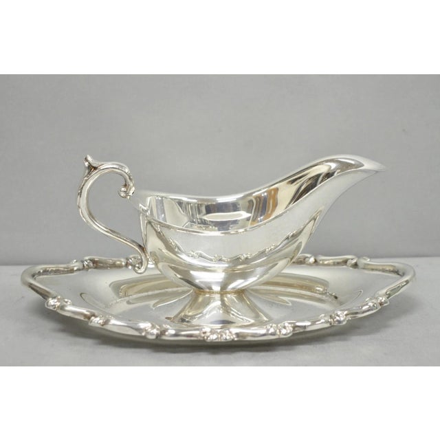 Vintage FB Rogers Silver Plated Victorian Gravy Sauce Boat w/ Attached Dish. Circa Mid 20th Century. Measurements: 4" H x...