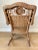 Wood Mid 20th Century Vintage Cottage Chic Wicker Rattan Medallion Wingback Adult Rocking Chair For Sale - Image 7 of 12
