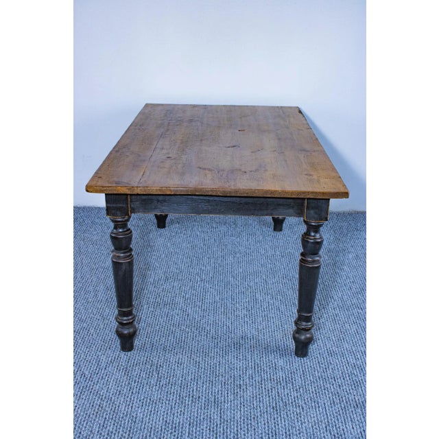 This striking farm table beautifully blends antique authenticity with timeless craftsmanship. The tabletop is made from...