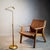 Modernist articulate adjustable height and angle floor pole lamp, made of golden chromed metal. Estimated that it was...