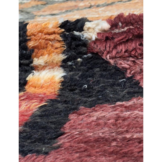 Modern Boujad Rug | Handwoven Wool Rug in Maroon & Orange with Abstract Lightning Motif Product Overview This striking...