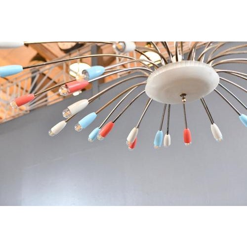 XL Mid-Century Sputnik Chandelier Circa 1960s 36 curved steel and brass arms - Multicoloured bulb holders - Takes x36 E27...