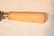 19th century bread knife from England. The handle is made from bone and is hand carved with a heat pattern. The blade is...
