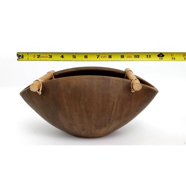 Mid 20th Century ceramic Japanese Ikebana style decorative bowl with bamboo handles. This oblong bowl is large and heavy...