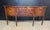 A Georgian period Sideboard dating to around 1800. Made from Mahogany and having 4 large drawers. Bow fronted, brass lions...