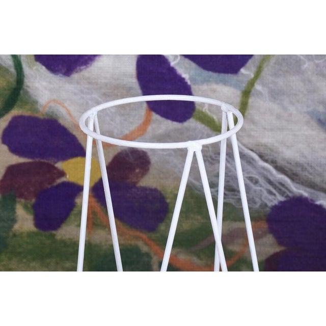 This stylish plant stand dates back to the 1950s and was manufactured in Czechoslovakia, where it represents a highly...