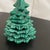 These Vintage Ceramic Christmas Tree Stacking Ashtrays with Lighter are a unique and charming collectible for any holiday...