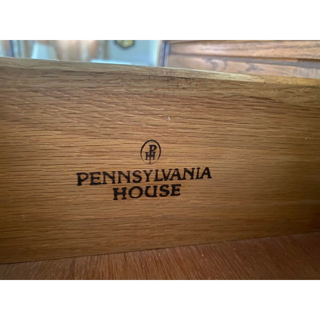 Pennsylvania House Arts and Crafts Stickley Style Solid Oak Door Chest. It has five pull-out drawers on the right and a...