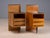 A distinctive pair of vintage Czech bedside tables designed by Mojmir Požar in the 1960s. Each cabinet features a warm...