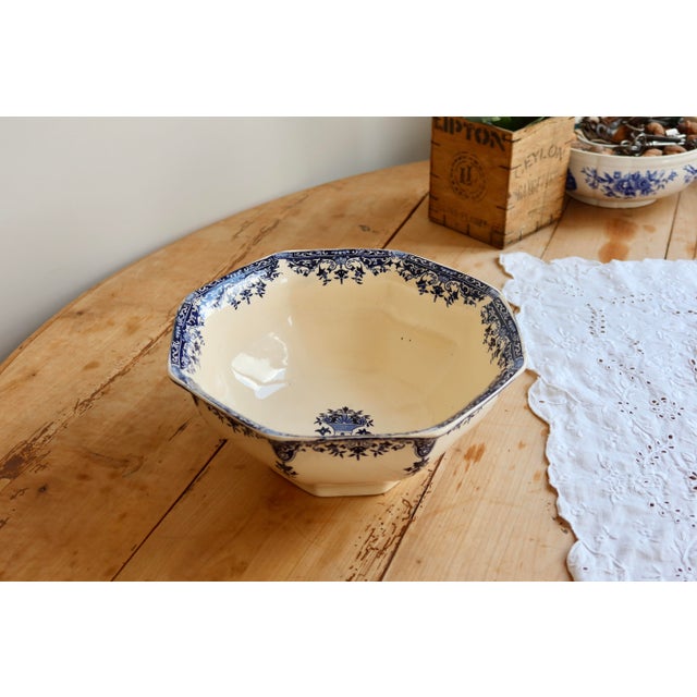 Large Longchamp ironstone salad bowl, Rouen pattern, late 19th century. Its deep blue decoration and octagonal shape make...
