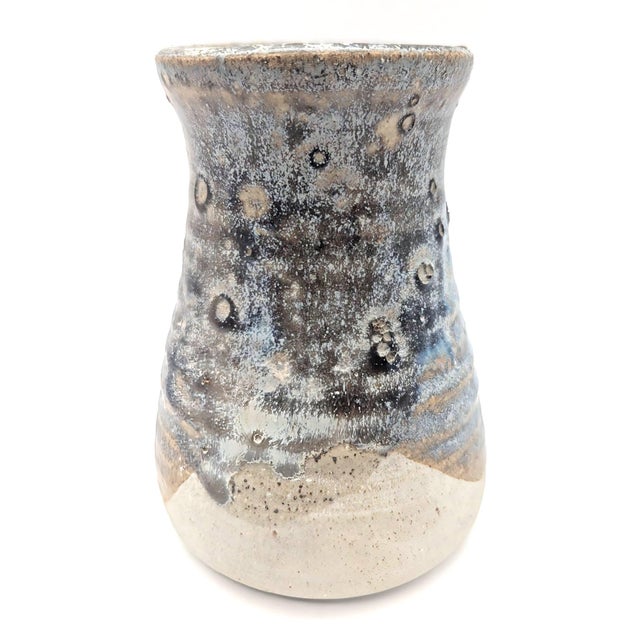 Offered is a vintage 1980s artisan-signed stoneware bud vase with a speckled salt or crystalline glaze in tones of gray,...