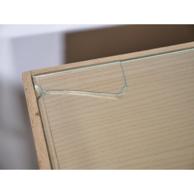 Very stylish bedside tables from the 1960s. The distinctive metal legs are original to the period. A unique piece of...