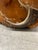 Great vintage sculpture or footstool made of wood with brass accents.