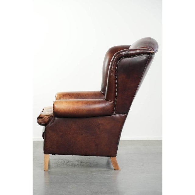 Vintage English Cowhide Wing Armchair For Sale - Image 5 of 13