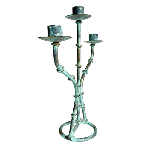 Elevate your home decor with the Rustic Metal Bamboo Verdigris 3-Arm Candelabra, a stunning centerpiece that combines...