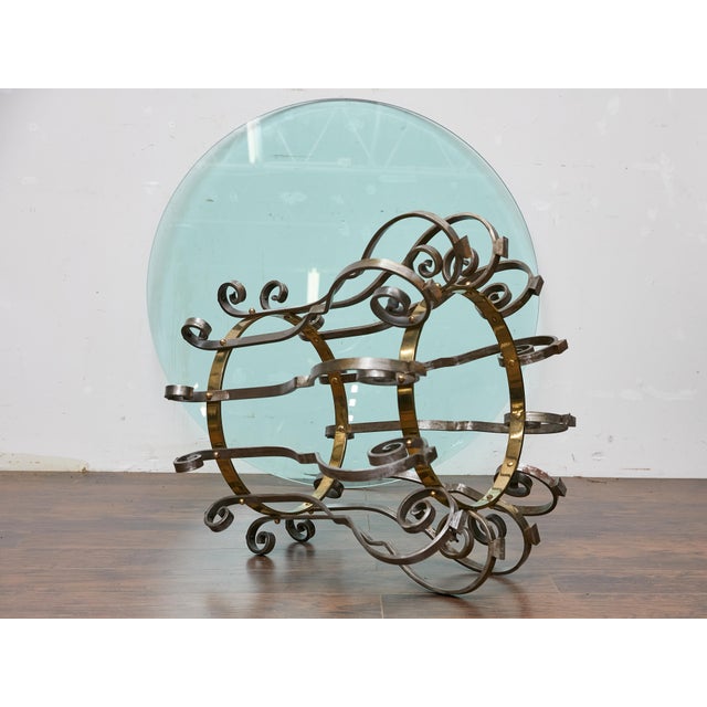 Combining sculptural form with refined materiality, this Italian center table from the Midcentury period strikes a...