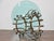 Combining sculptural form with refined materiality, this Italian center table from the Midcentury period strikes a...