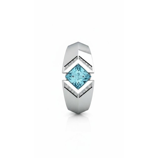 Square-Cut Blue Topaz Architectural Silver Cocktail Ring. Contemporary Blue Topaz and Silver Designer Ring. A bold...