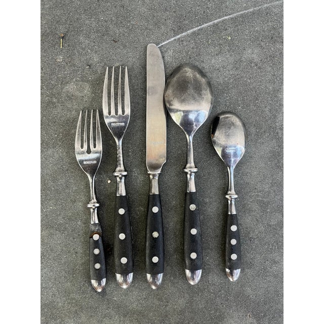 46 piece flatware set manufactured by LC Germain and is stamped on the back of each utensil “Rostfrei”. The set includes:...