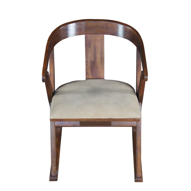 Drexel Heritage Campaign Style Arm Chair, circa 1970s. Features a distressed walnut finish with a curved back and 'x'...