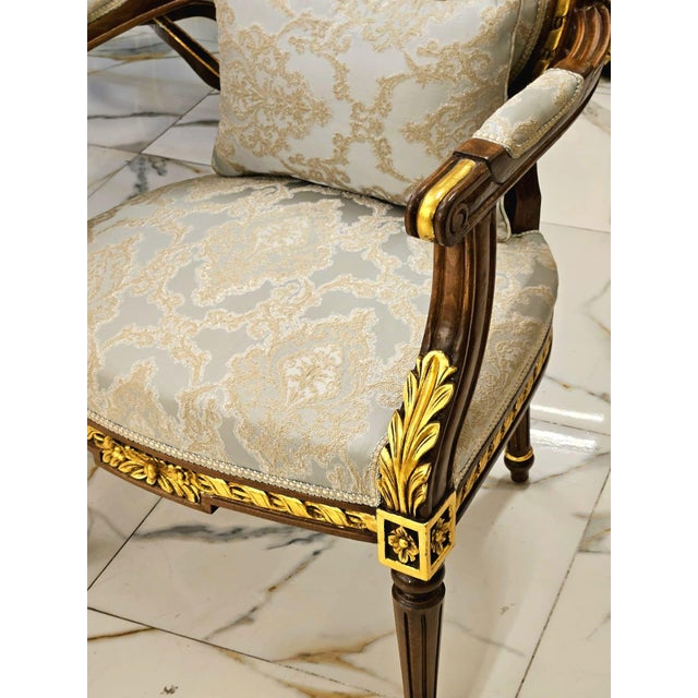 Elevate your home with the timeless elegance of this French Louis XVI accent armchair, expertly handcrafted with a...