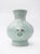 Wondefully ornate Chinese porcelain vase with elephant ring pull detail, finished in a celadon glaze. 1960's vintage and...