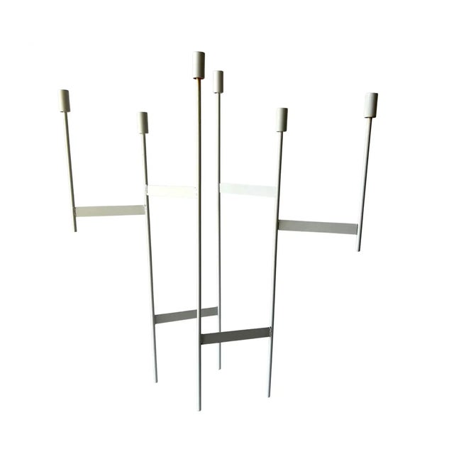 Large scale, powder coated metal candelabrum designed by Donald Drumm for Raymor. Piece measures 31.75" by 28" by 8.5" and...