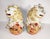 A pair of vintage Japanese Kutani Foo Dogs or temple lions. Cerami with bright colors and design. Foo Dogs are mythical...