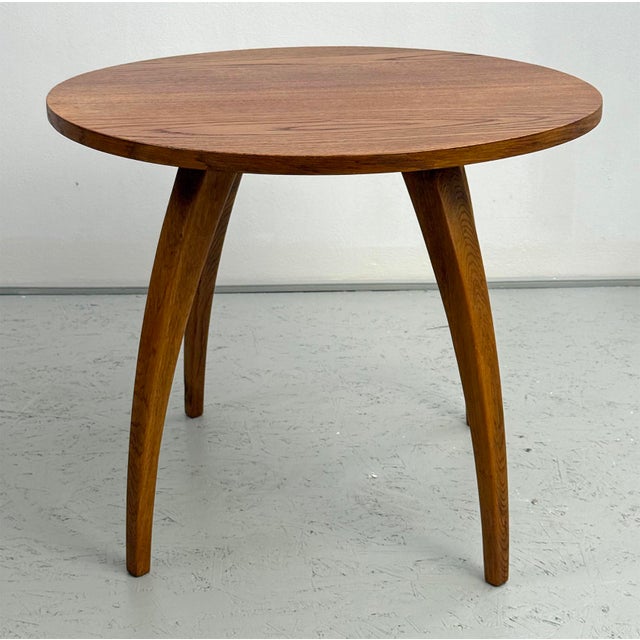 A round coffee table, model h-242, designed by renowned czechoslovak designer jindřich halabala for spojené up závody. the...