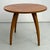 A round coffee table, model h-242, designed by renowned czechoslovak designer jindřich halabala for spojené up závody. the...