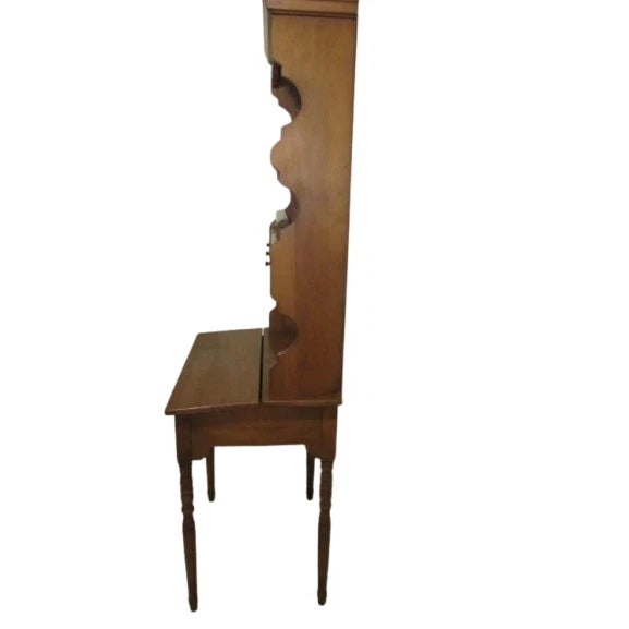 This vintage antique 1960s lift top Maple Wood desk with hutch attached features turned legs, giving it a unique and...