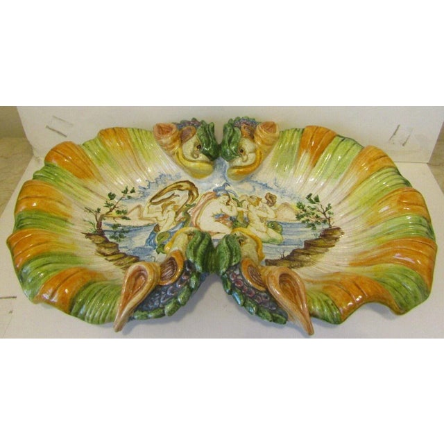 Armando Poggi Dipinto a Mano Hand Painted Italian Pottery Dolphin Scene Centerpiece Features scalloped edges resembling...