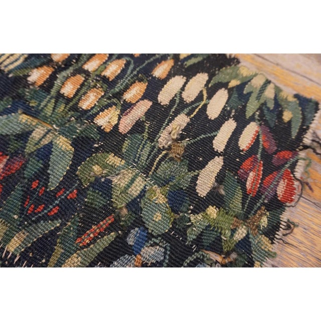 Antique Tapestry Square Small Scatter Size Wool & Silk Black Rug, Circa Date: 1550s. This extraordinary piece represents a...