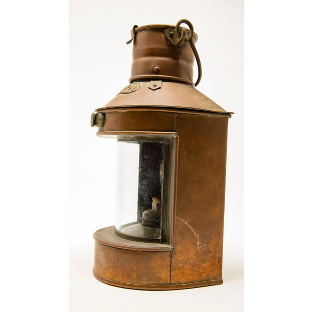 Offering this copper stern ship lantern. Made by Tung Woo out of Hong Kong. Has the Stern label on the top, and a clear...
