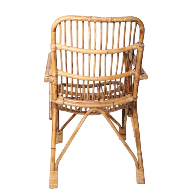 Voguish pair of mid century bamboo, rattan scoop form lounge chairs, ion very good, original, clean and ready to use...