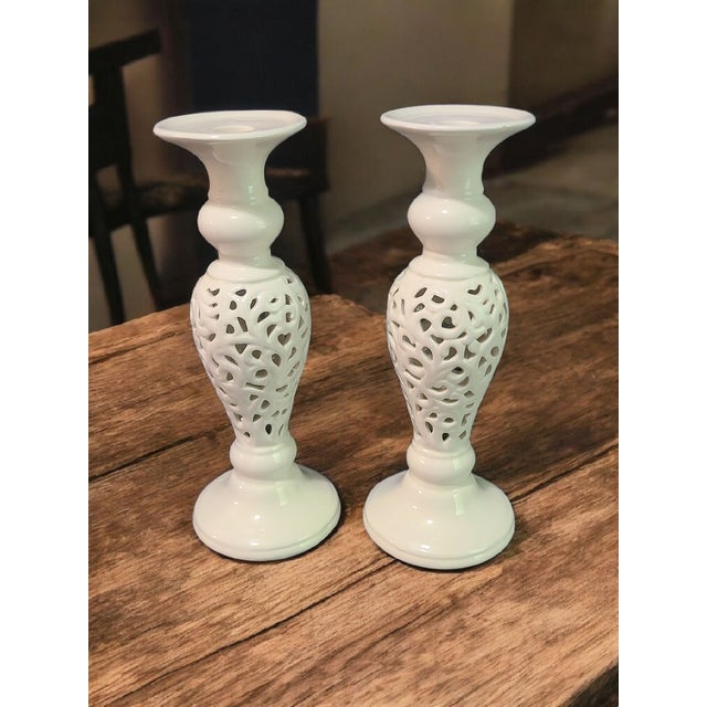 The Vintage Pair Davco Ceramic Perforated Candlesticks in Cream White are elegant and charming candle holders made from...
