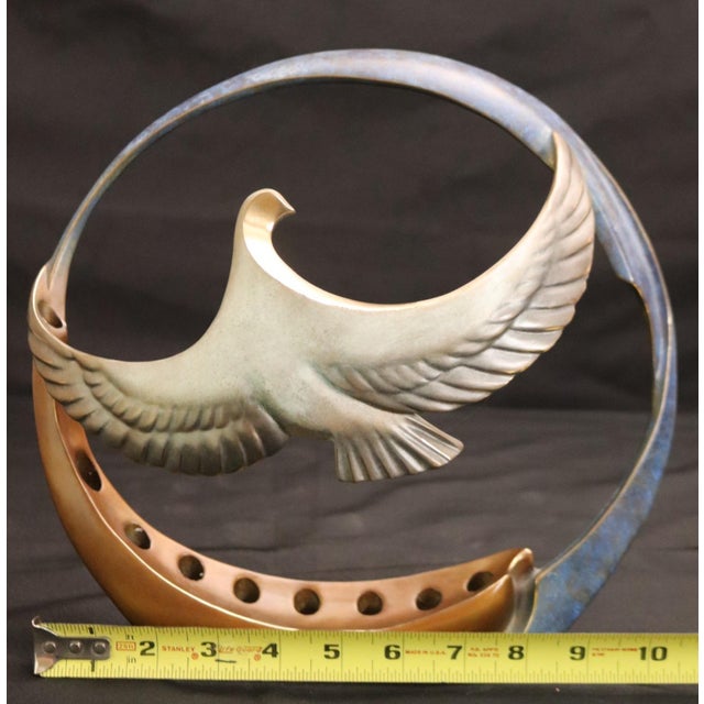 This striking limited edition bronze sculpture titled “Icarus” is a 1993 original by renowned American artist Bill Mack....
