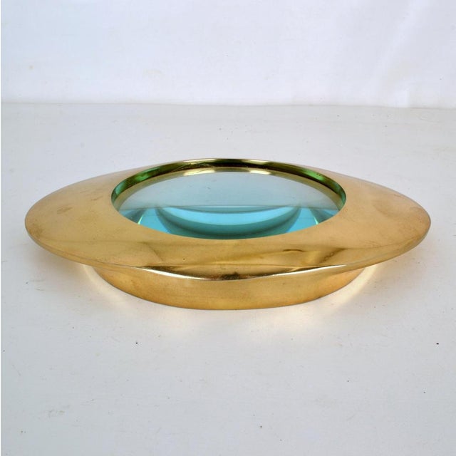 Large decorative magnifier lens with domed glass magnification, encased in eye shape brass cast frame. Very decorative...