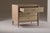 Oak wood Lightly brushed bleached oak finish Glass top Gold metal feet at the ends of the legs 3 drawers - brass rings