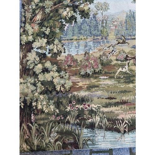 "Discover the timeless elegance of this exquisite vintage French tapestry featuring a hunting with hounds scene. A noble...