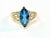 14k yellow gold marquise blue topaz ring, 3.10 Grams TW. The dimensions are approximately 14 mm x 7 mm. Approximately 3...