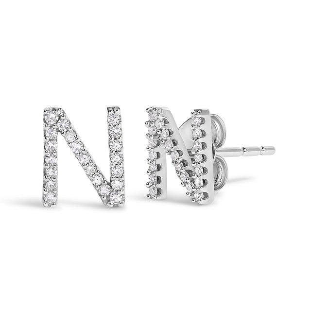 Expertly crafted to symbolize individuality and grace, this exquisite "N" initial stud earring is fashioned from radiant...