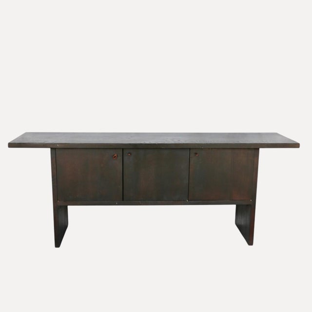 Large Dark-Stained Oak Sideboard with Overhanging Top and 3 Large Doors with Leather Straps, France, 1950s, in Very Good...