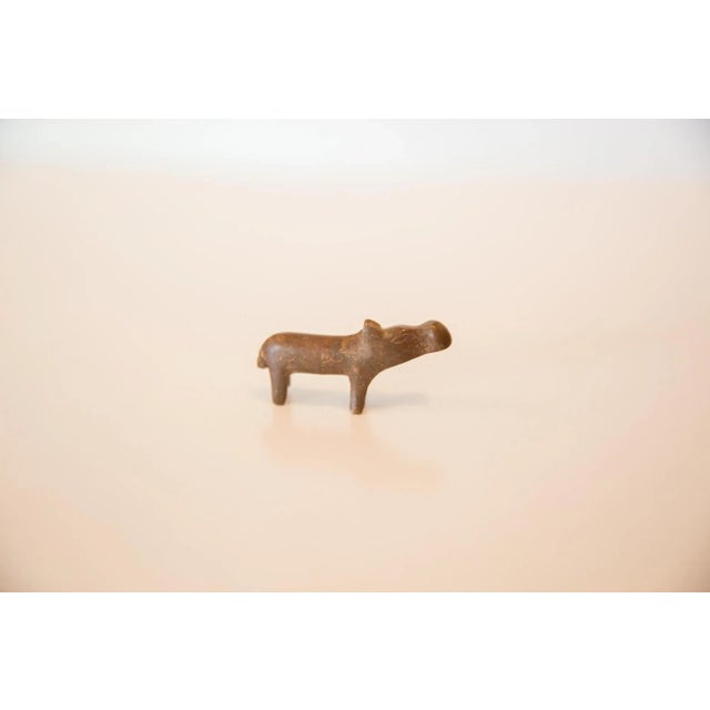 :: Vintage handmade copper casting of a miniature hippopotamus. Circa mid 20th century and possibly older, this piece has...