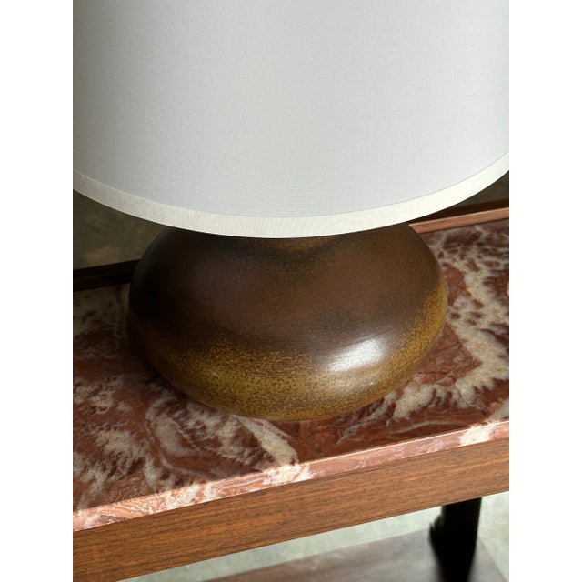 Large table lamp by Lotte and Gunnar Bostlund. While produced in Canada and the US, the ceramicist duo were from Denmark....