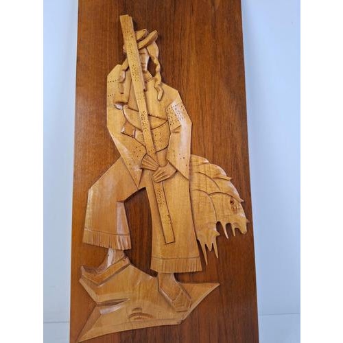 This midcentury wooden wall relief originates from Czechoslovakia, dating to circa 1960. The piece features a stylized...