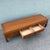 An elegant Taiwanese Ming-style coffee table by Ricardo Lynn, beautifully crafted from warm walnut with clean...